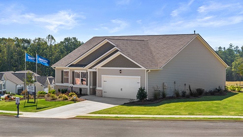 Exterior home with stone detailing and cladding