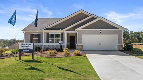 Exterior home with stone detailing and cladding