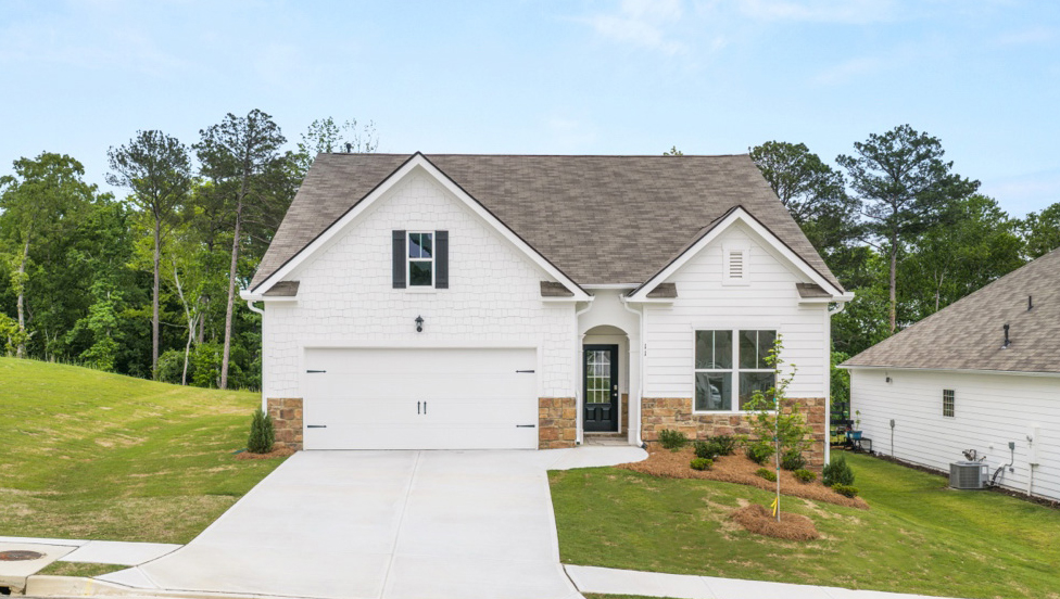 Exterior home with stone detailing and cladding