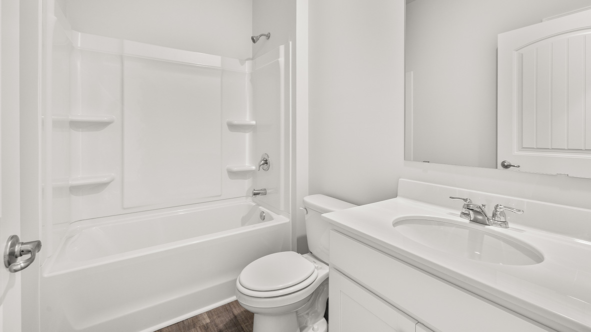 Interior bathroom sink and full-sized shower