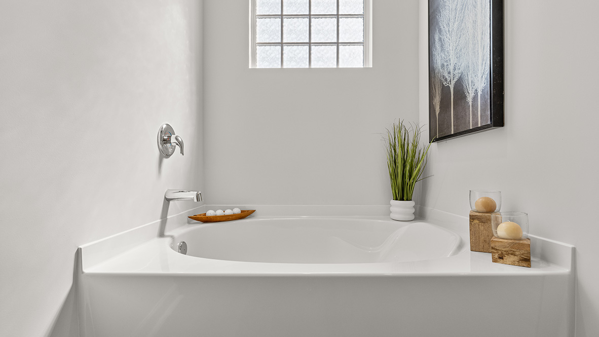 Interior primary bathroom with bath tub