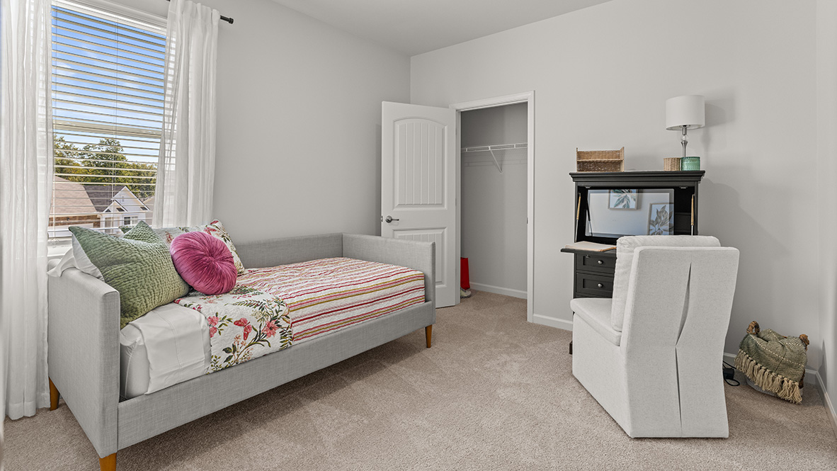 Interior bedroom with closet and window
