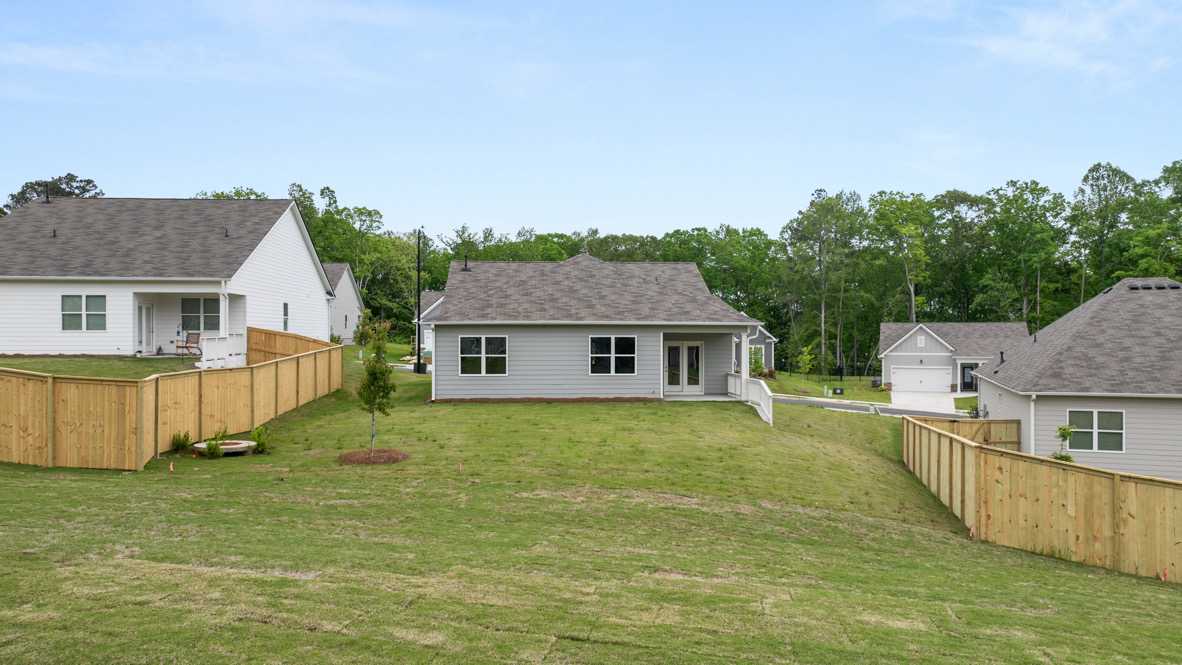Back exterior of the Cali floorplan by D.R. Horton in Lost Creek Dallas Georgia with classic elevation and covered back porch