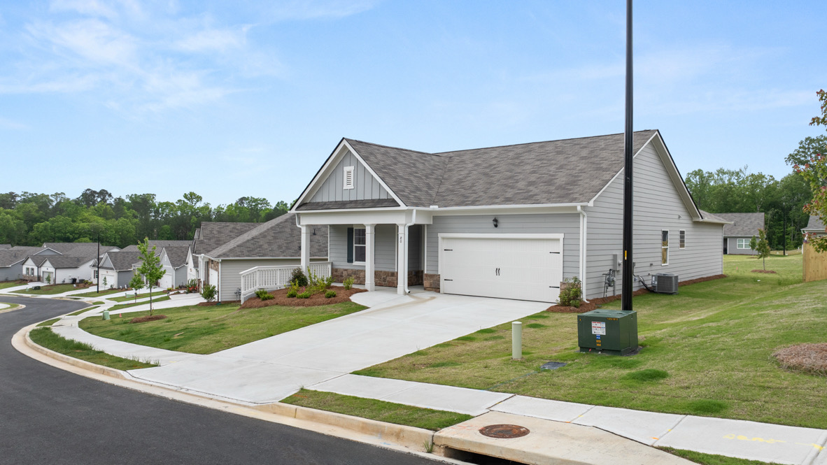 Front exterior of the Cali floorplan by D.R. Horton in Lost Creek Dallas Georgia with classic elevation