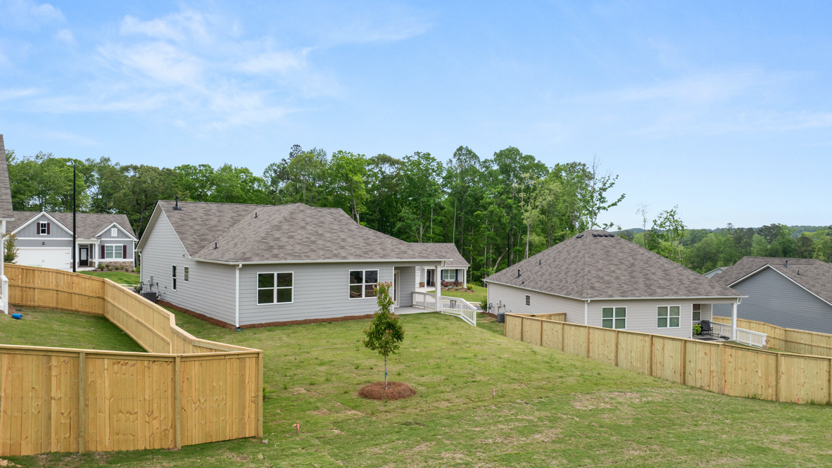 Back exterior of the Cali floorplan by D.R. Horton in Lost Creek Dallas Georgia with classic elevation and covered back porch