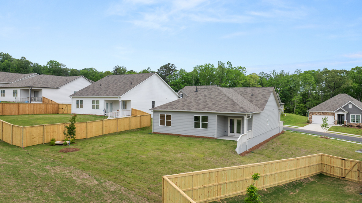 Back exterior of the Cali floorplan by D.R. Horton in Lost Creek Dallas Georgia with classic elevation and covered back porch