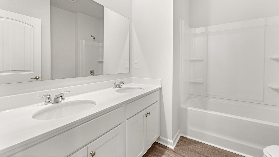 Interior bathroom with double sink and shower