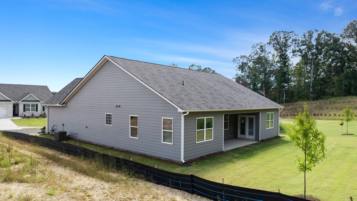Back exterior of Denton Plan by D.R. Horton in Lost Creek Dallas Georgia with classic elevation and covered back porch