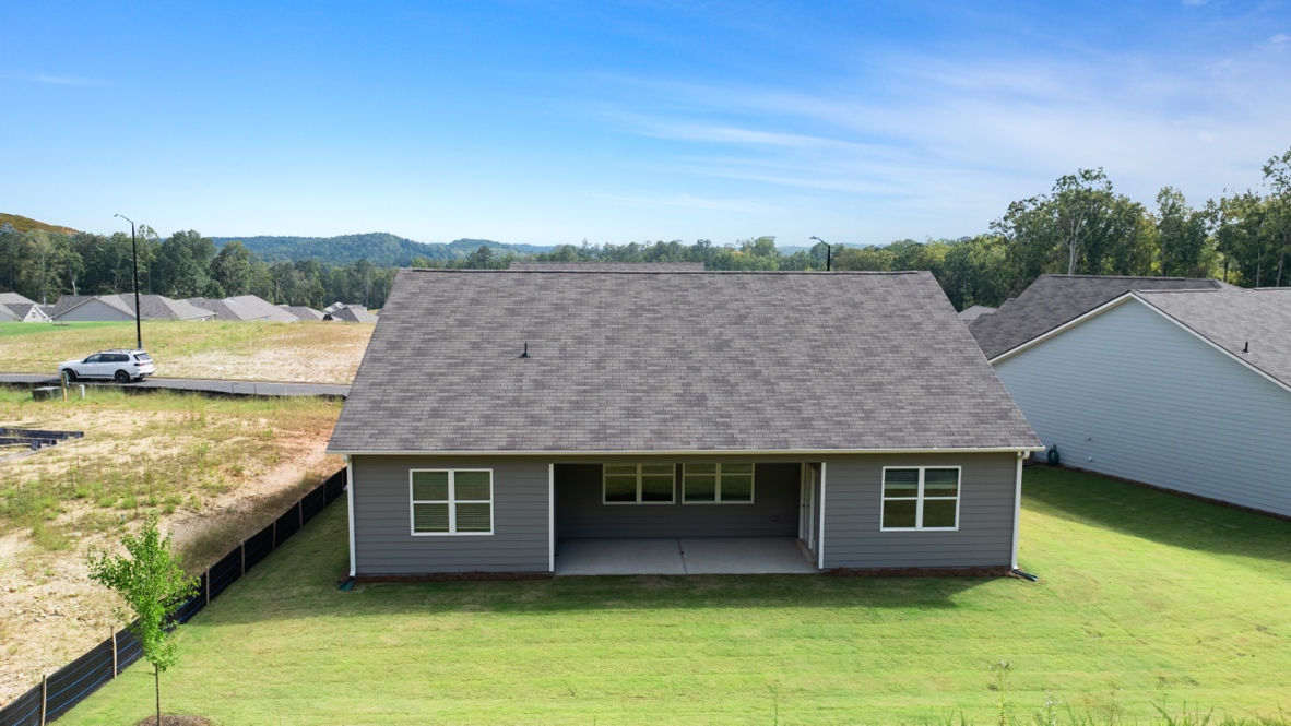 Back exterior of Denton Plan by D.R. Horton in Lost Creek Dallas Georgia with classic elevation and covered back porch