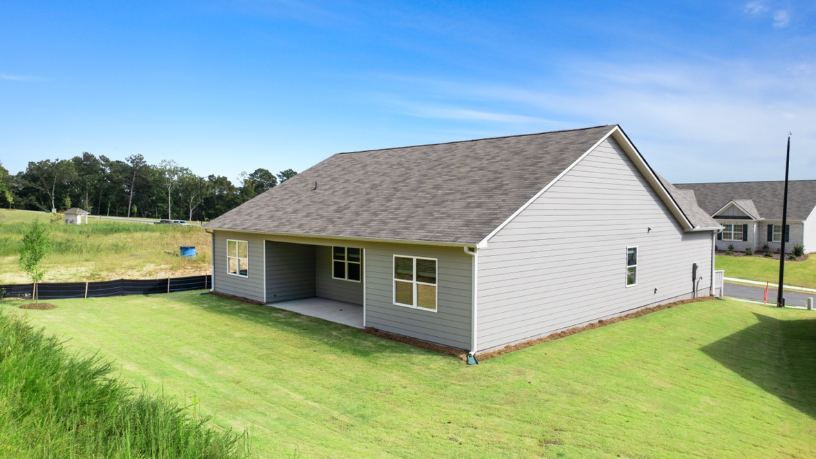 Back exterior of Denton Plan by D.R. Horton in Lost Creek Dallas Georgia with classic elevation and covered back porch