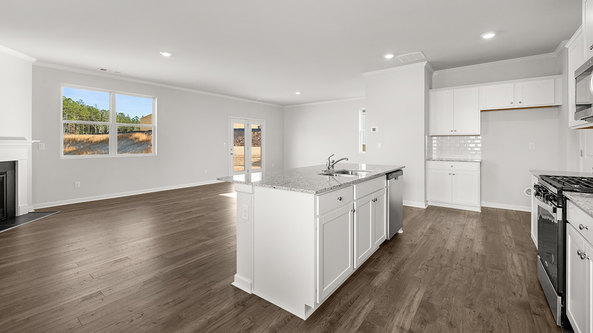 elston updated kitchen with dark hardwood flooring and white cabinets