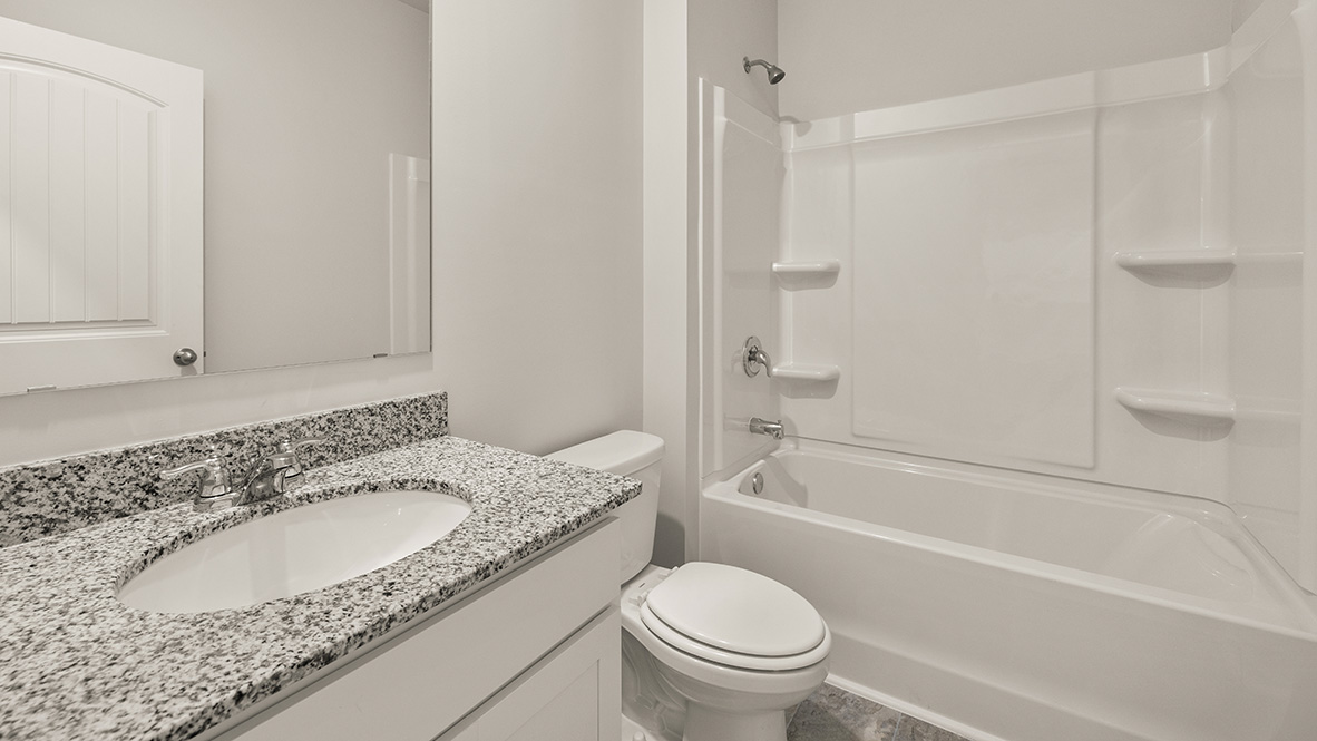 Interior bathroom with sink and full-sized shower