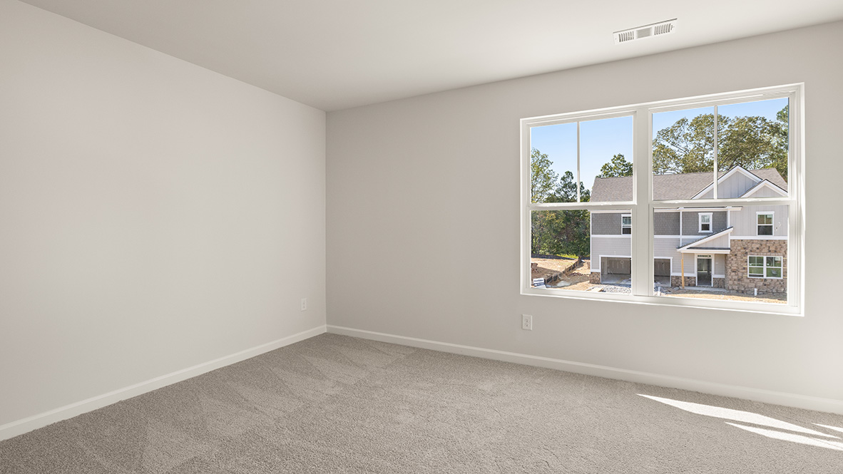 Interior bedroom with large window