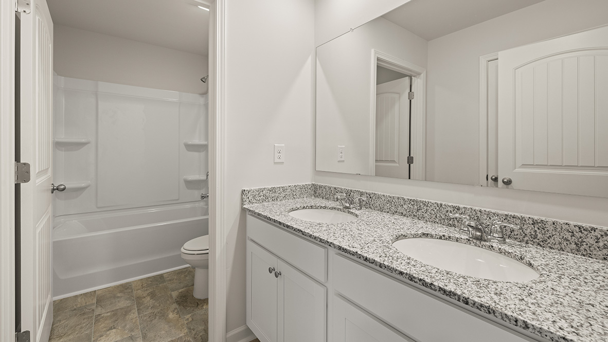 Interior bathroom with sink and full-sized shower