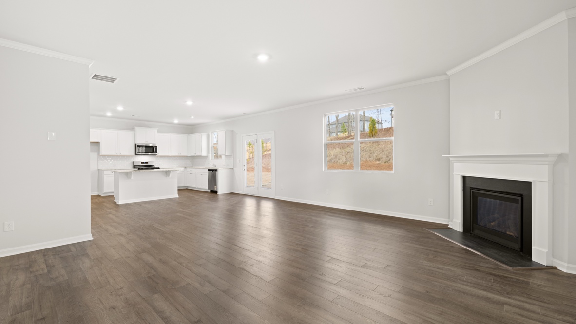 Interior living area open to kitchen and dining area