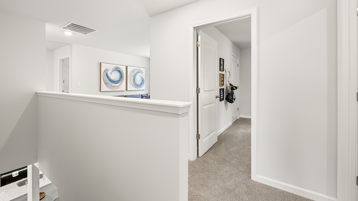 Interior upstairs loft area open to staircase