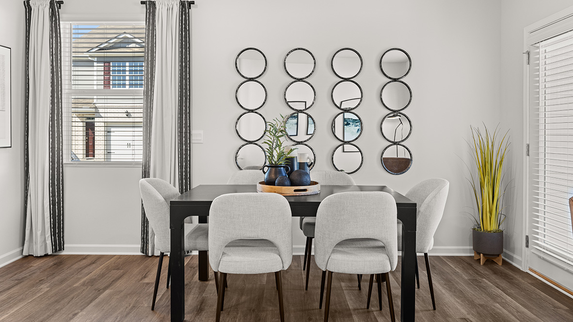 Interior dining area next to back patio door