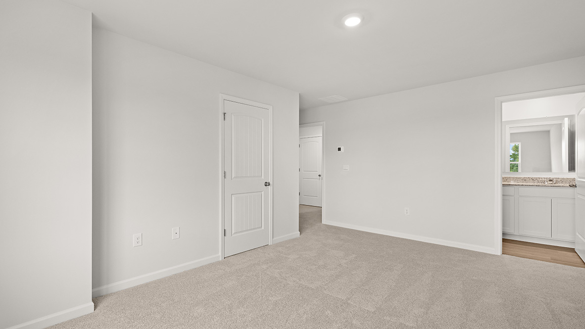 Interior primary bedroom with closet