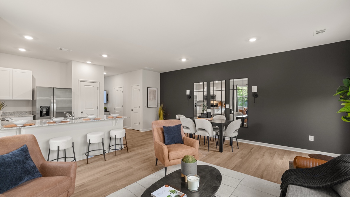 Interior living area open to dining area and kitchen