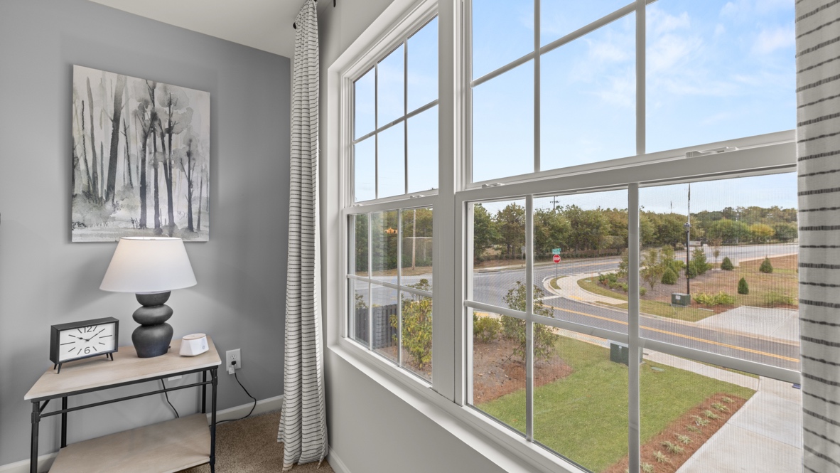 Interior bedroom with large window