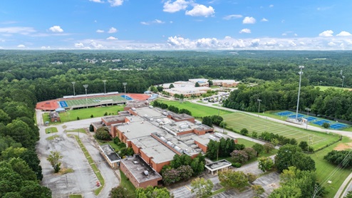 Aerial view stadium near community