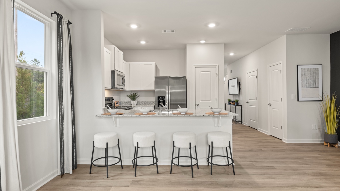 Interior kitchen with countertop and white cabinets