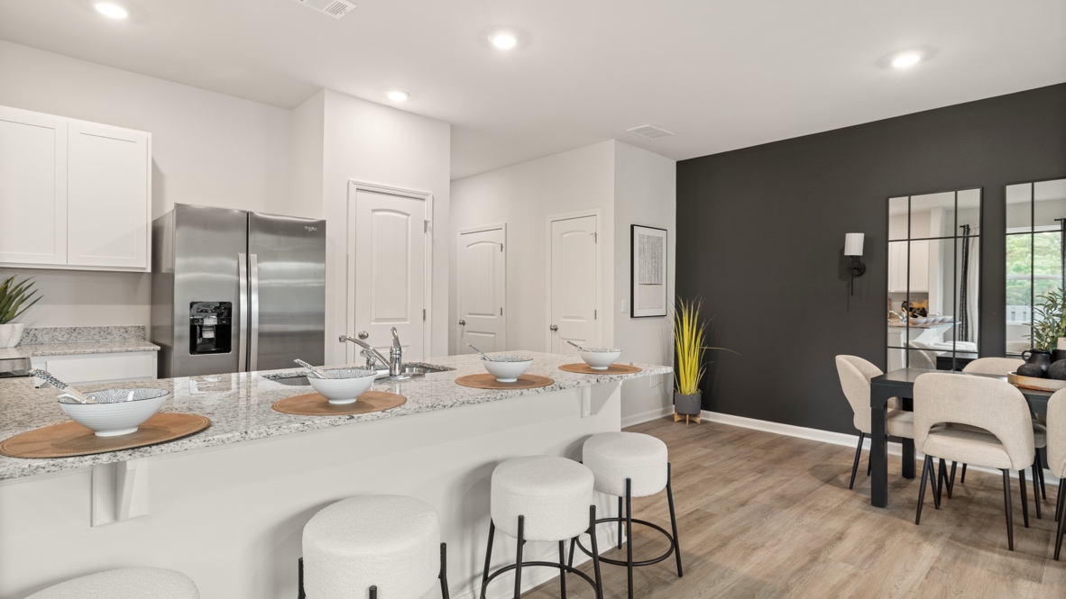 Interior kitchen with countertop and white cabinets