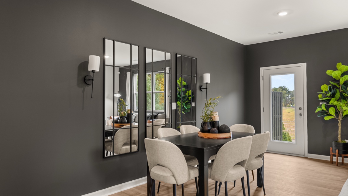 Interior dining area next to back patio door