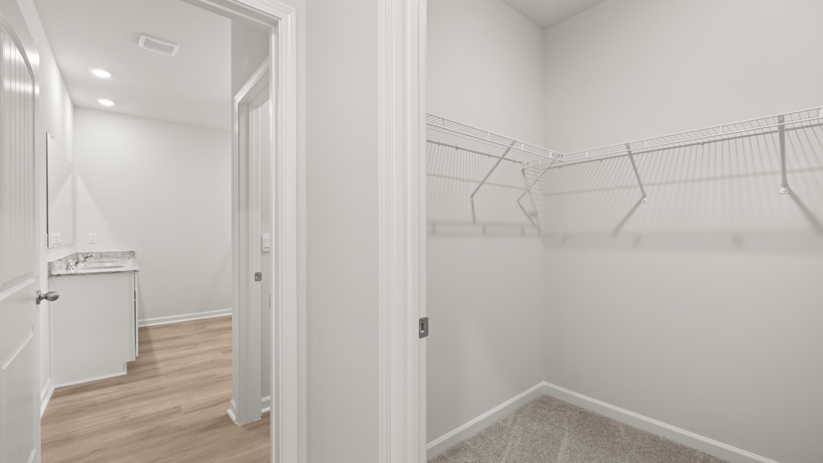 Interior primary walk-in closet