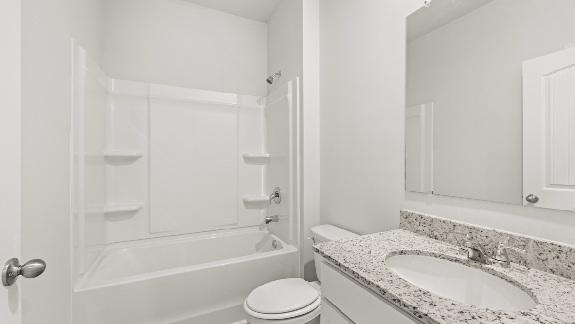 Interior bathroom with sink and full-sized shower