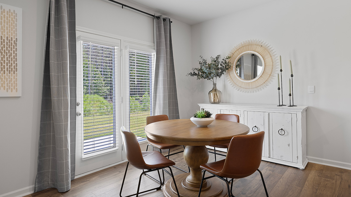 Interior dining area next to back patio doors