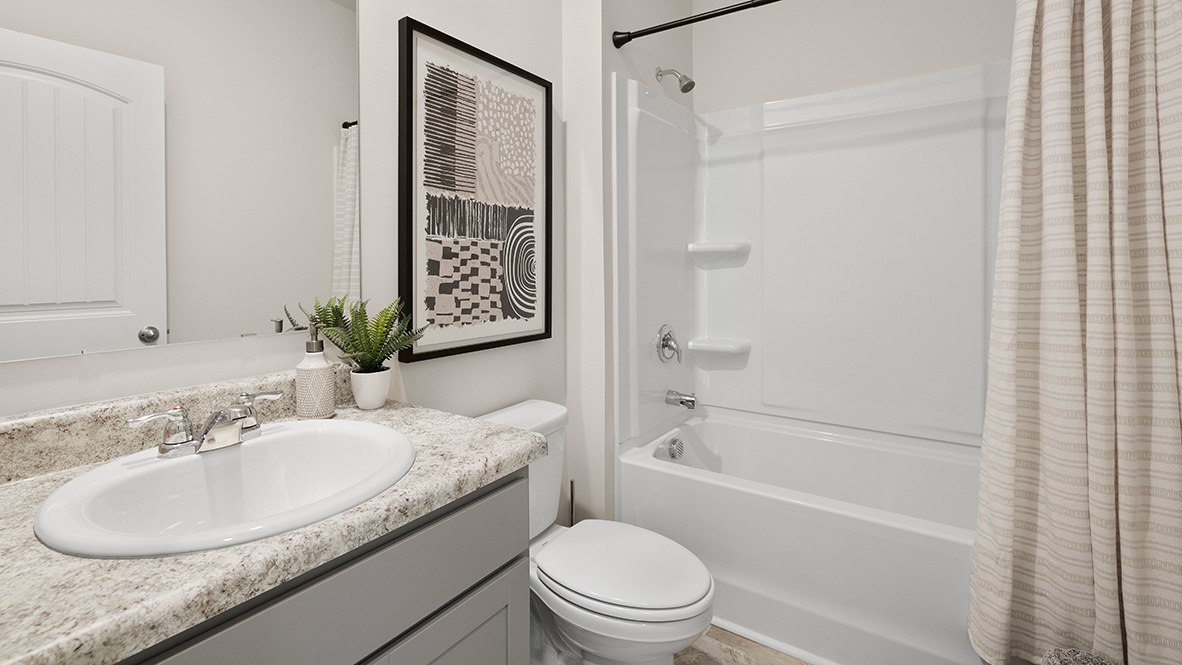 Interior bathroom with sink and full-sized shower