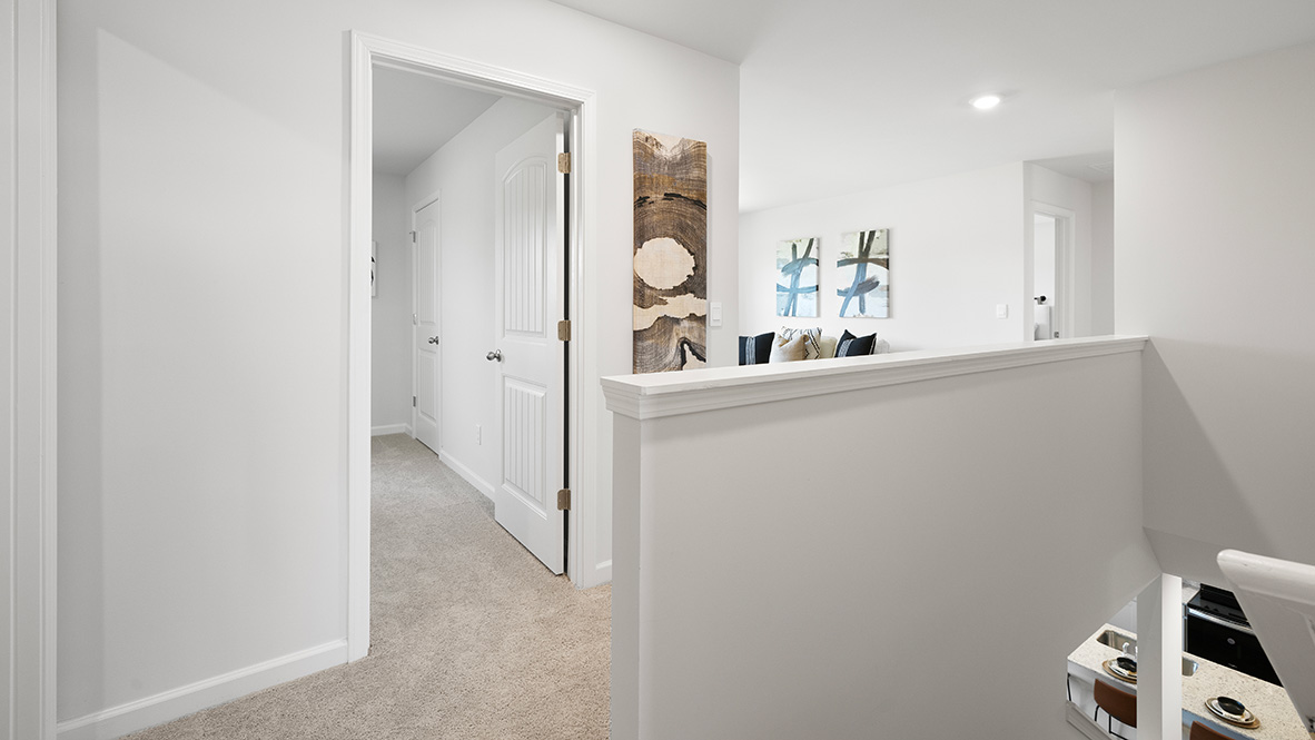 Interior upstairs loft area open to staircase