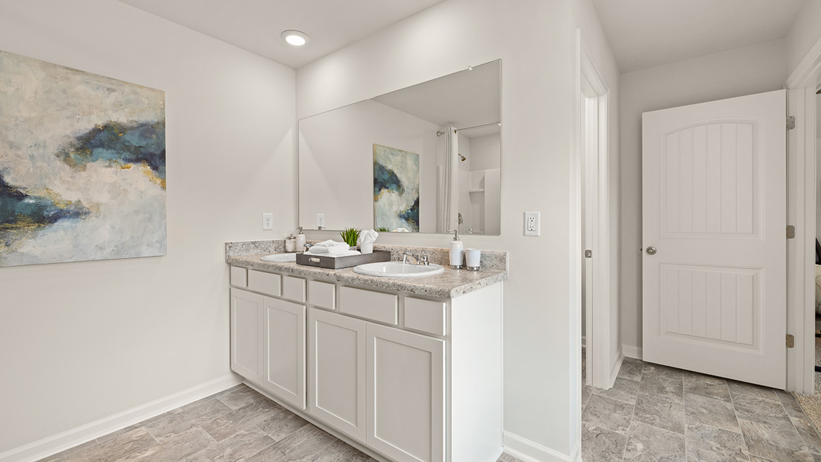 Interior primary bathroom with double sink
