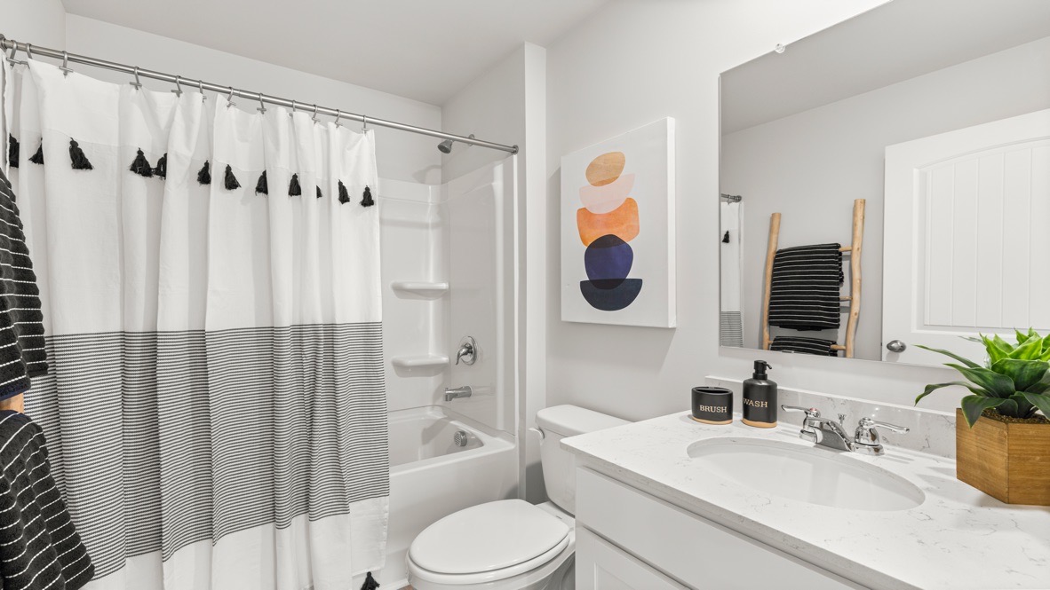 Interior bathroom with sink and full-sized shower