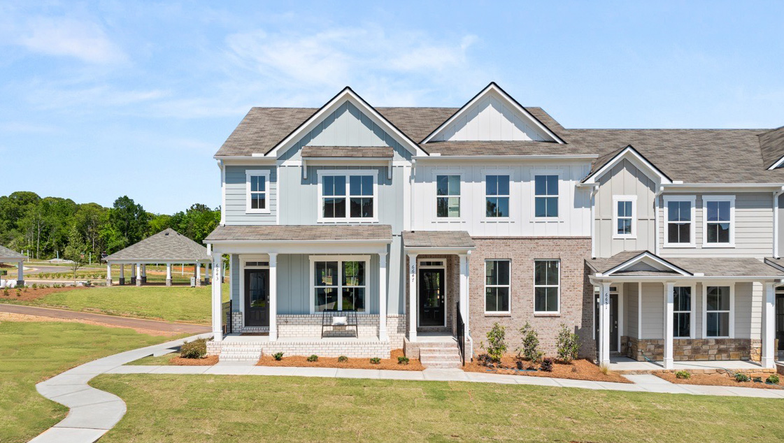 Exterior two-story homes with stone detailing