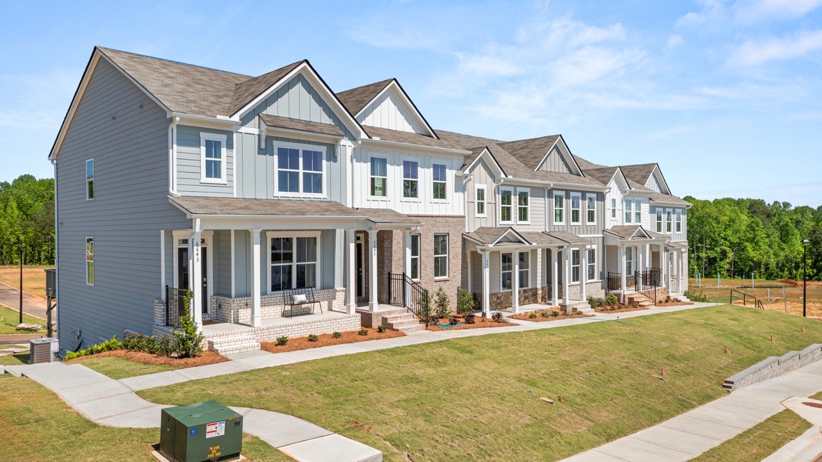 Exterior two-story homes with stone detailing