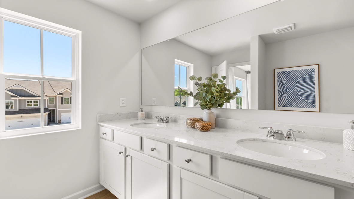 Interior primary bathroom with double sink