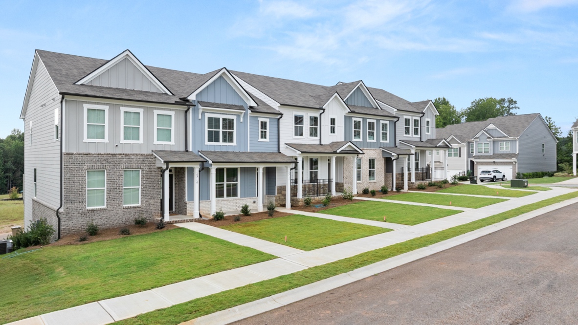 Exterior two-story homes with stone detailing