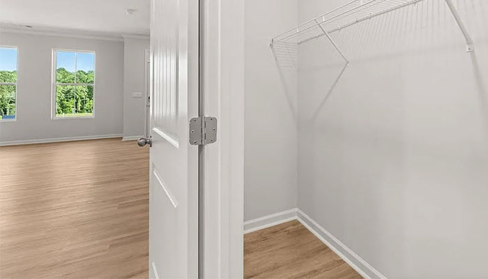 Interior hallway with hall closet
