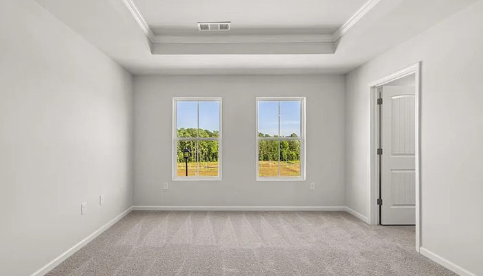 Interior bedroom with large windows