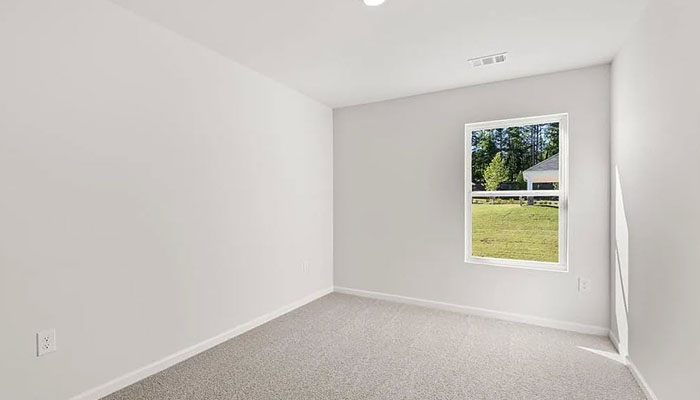 Interior bedroom with large window