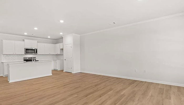 Interior living area open to kitchen with center island