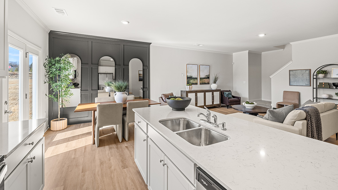 open concept kitchen overlooking the dining and living area