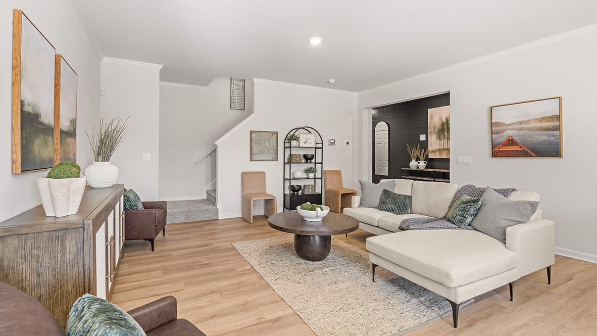 cozy living room with a white section and neutral contemporary decor
