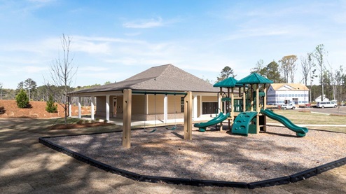 fairhaven community clubhouse with playground