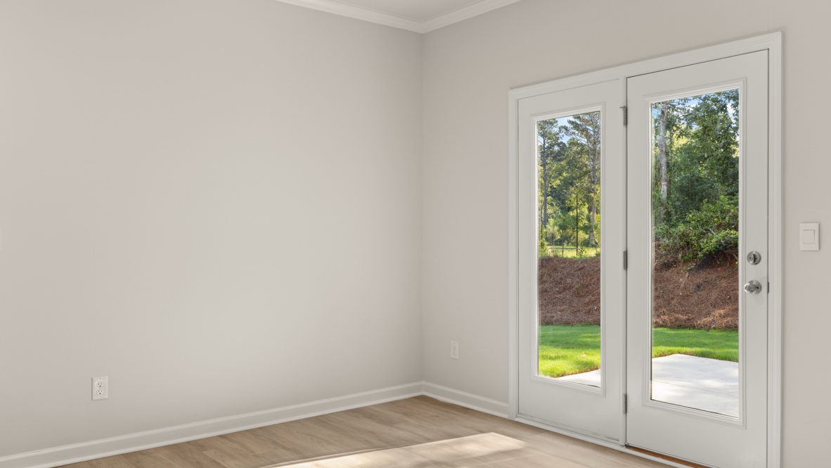 Interior dining area next to back patio doors