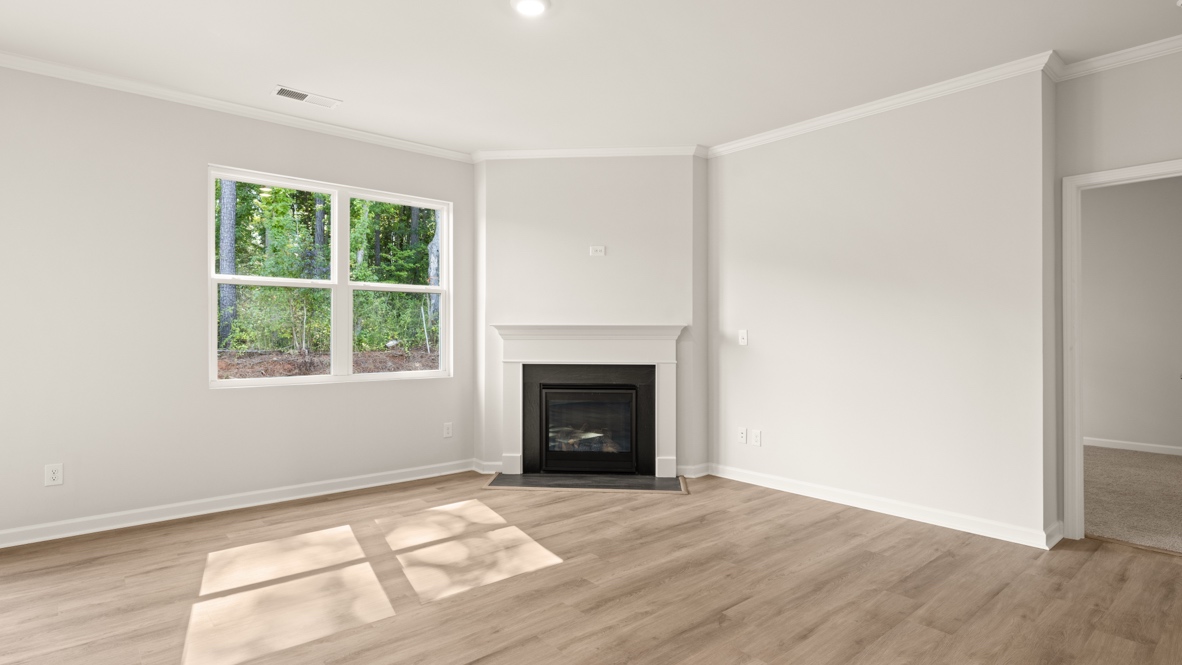 Interior living area with window and fire place