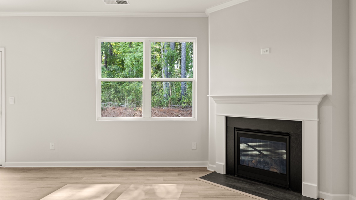 Interior living area with window and fire place