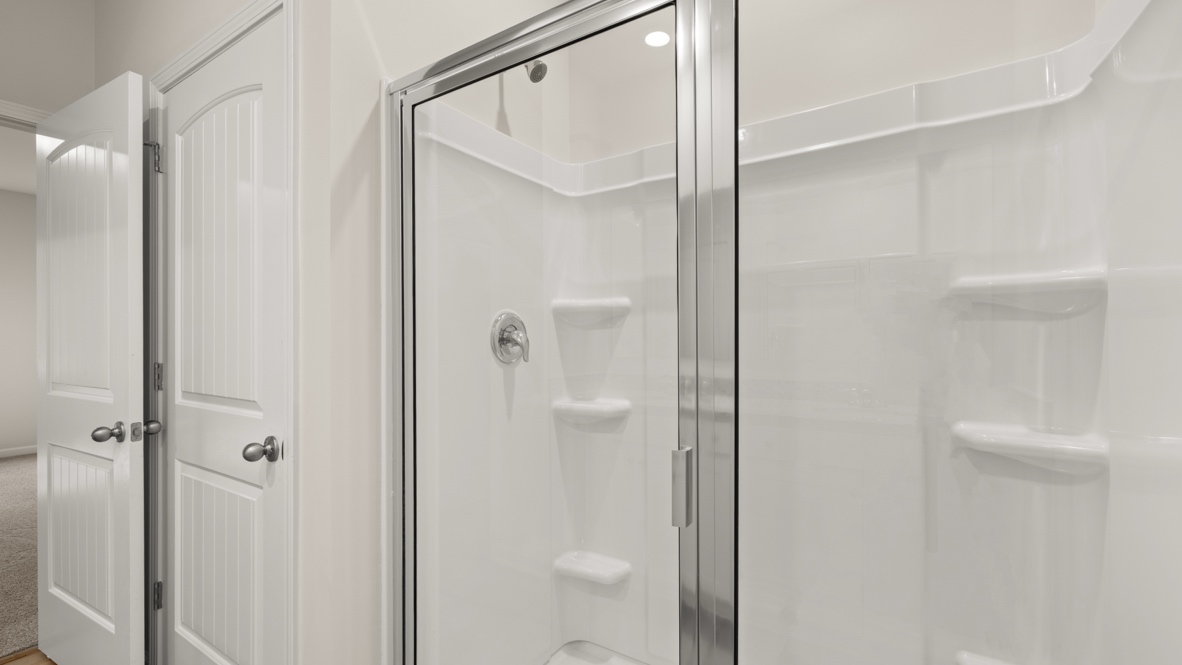 Interior primary bathroom with shower